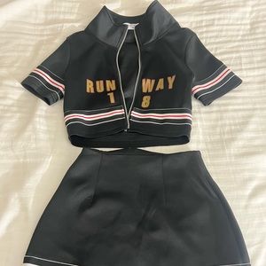 Black top and mini skirt